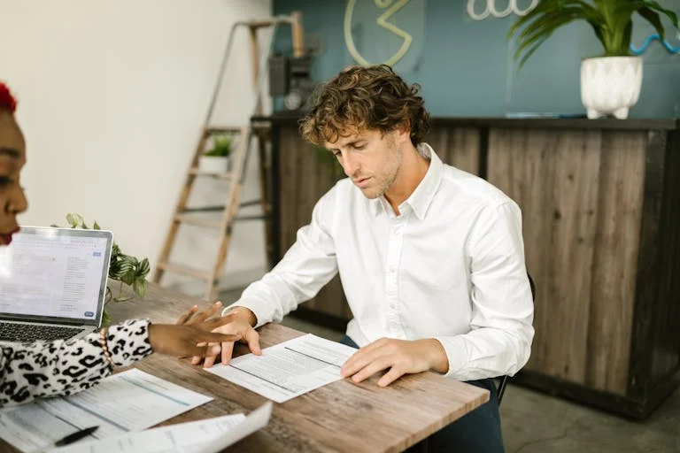 A Man Sitting at the Table